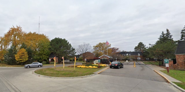 The Coach Apartments entrance on Providence Drive in Southfield, Michigan