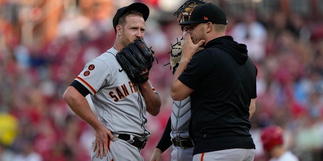 Alex Cobb meets with Patrick Bailey and Andrey Bailey