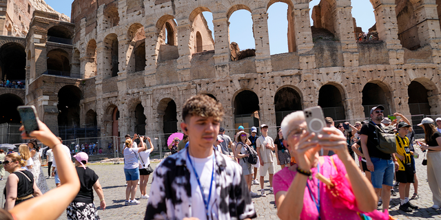Tourist outside the Colosseum