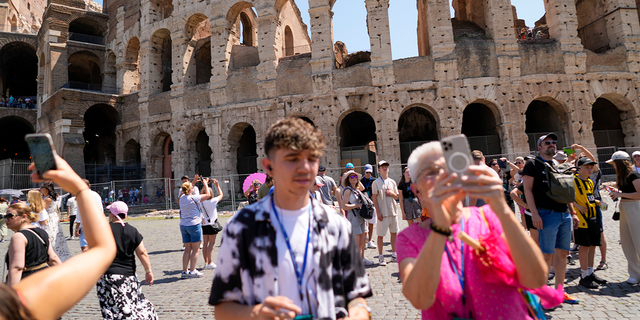 Tourist outside the Colosseum