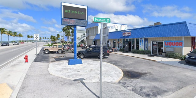 Conch Town Bar and Lounge shown across the street from the ocean.