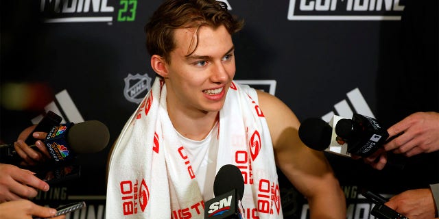 Connor Bedard speaks with media
