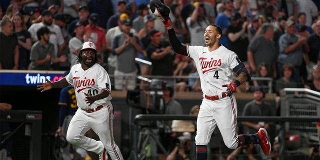 Carlos Correa celebrates