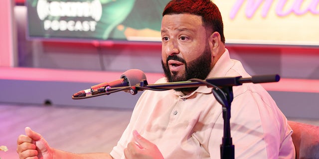 DJ Khaled in front of microphone