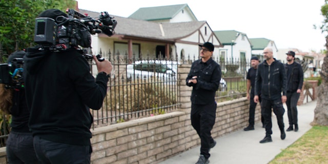 Zak shooting intro outside of Levy house