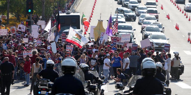 Protesters gather near Dodger Stadium entrance