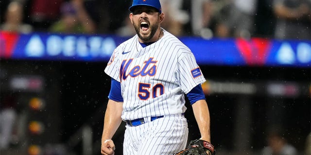 Dominic Leone celebrates