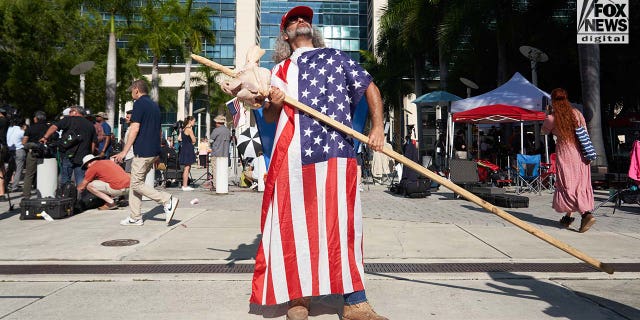 Demonstrators rally outside of a Miami Federal Courthouse ahead of Donald Trump's arraignment