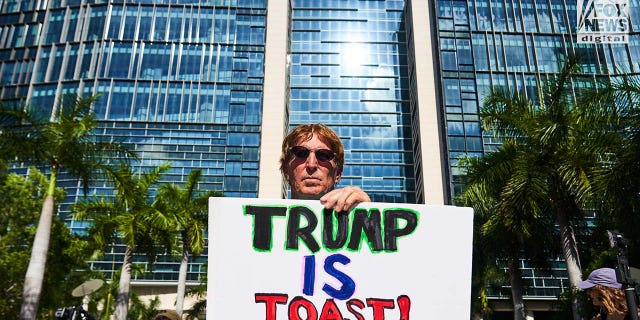 Demonstrators rally outside of a Miami Federal Courthouse ahead of Donald Trumps arraignment