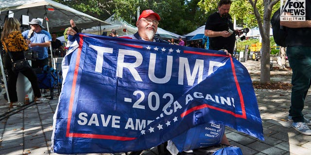 Demonstrators rally outside of a Miami Federal Courthouse ahead of Donald Trump's arraignment