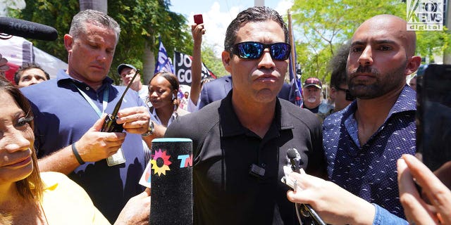 Mayor Francis Suarez of Miami speaks to members of the media outside
