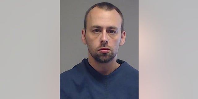 Karlton Dudley's mugshot after Texas woman found in lake