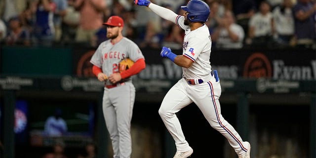 Ezequiel Duran celebrates home run