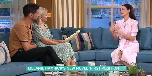 melanie hamrick, craig doyle and holly willoughby sitting on couch on this morning