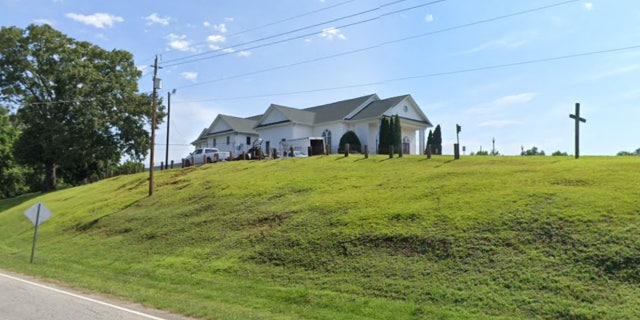 First Baptist Gowensville on top of hill seen from street