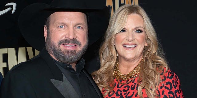 Trisha Yearwood and Garth Brooks smiling together