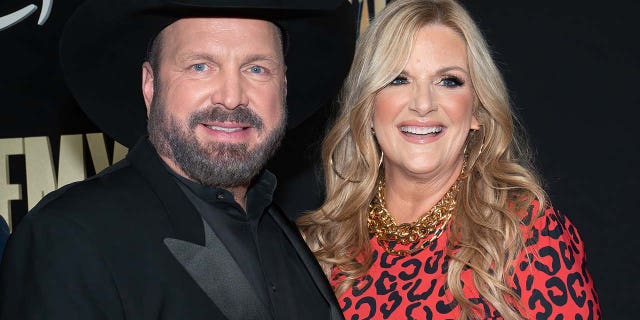 Trisha Yearwood and Garth Brooks smiling together