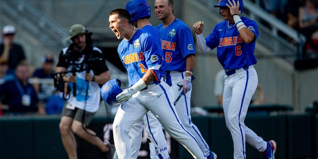 Florida takes hold of their College World Series bracket with victory over Oral Roberts 3 Ty Evans celebrates home run