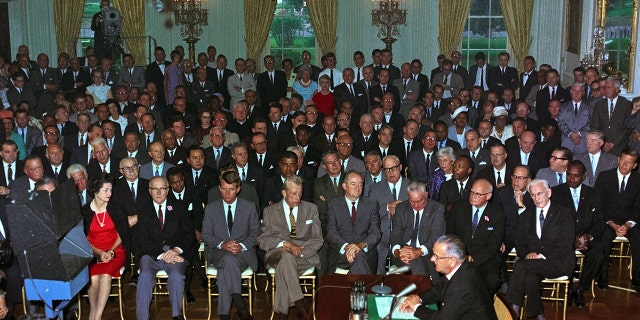 President Johnson signing the bill