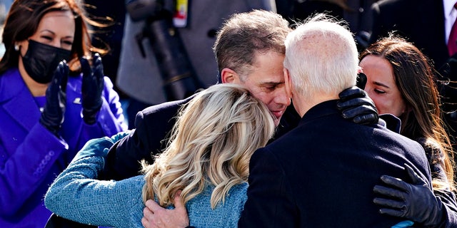 Hunter Biden embraces parents Joe and Jill Biden at the White House