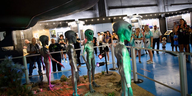 Aliens at museum exhibit