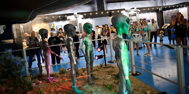 Aliens at museum exhibit