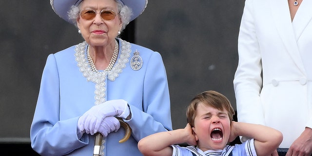 Prince Louis shouts and covers his ears as there is a special flypast over Buckingham Palace in front of Queen Elizabeth for her Platinum Jubilee