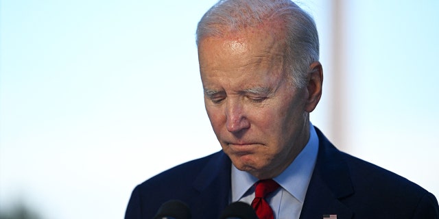 Joe Biden looking down