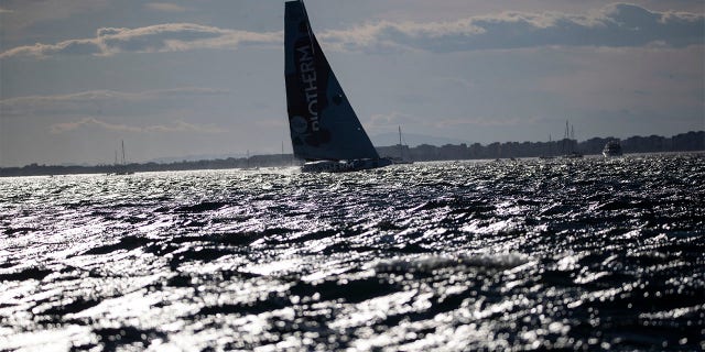 Imoca class sailing boat takes off at the start of the Ocean Race