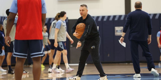 Darko Rajakovic coaches a team practice