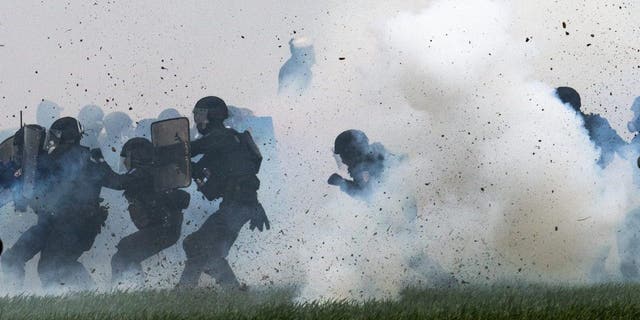 French police clash with climate protestors