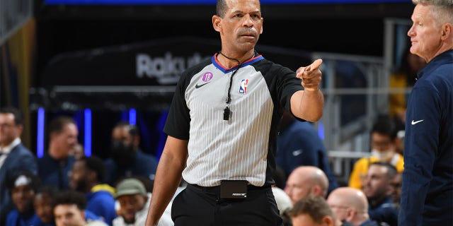 Eric Lewis calls an NBA game