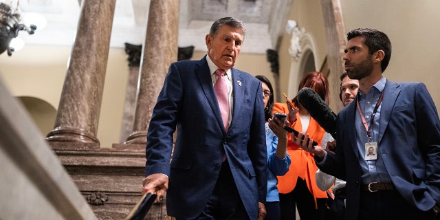 Joe Manchin greeted by press on Capitol Hill