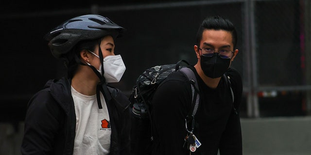 NYC residents wear masks 