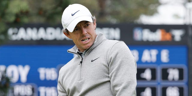 Rory McIlroy watches a putt