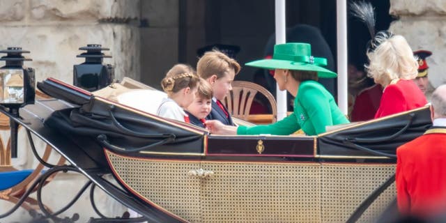 Princess Kate fixing Prince Louis