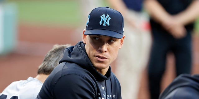 Aaron Judge looks on from the Yankees dugout