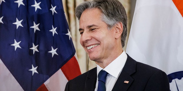 Blinken laughs during a luncheon with India's Modi