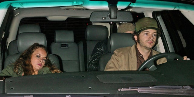 Bijou Phillips and Danny Masterson in a car