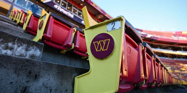 Seats at the Commanders stadium with the team logo