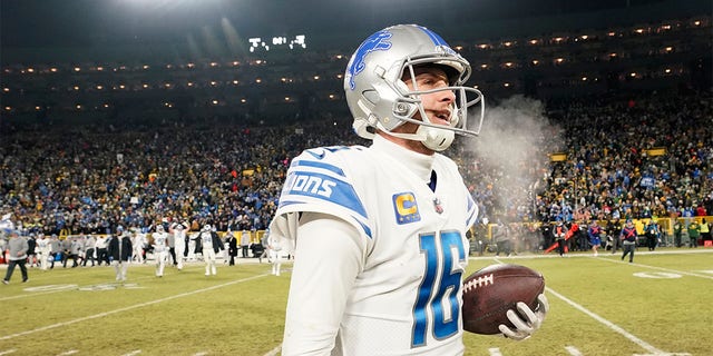 Jared Goff celebrates beating the Packers