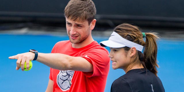 Emma Raducanu talks to her coach Sebastian Sachs