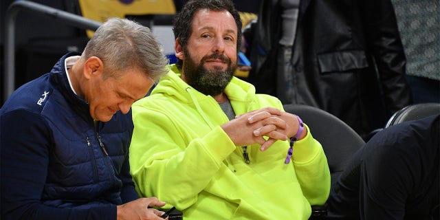 Adam Sandler attends an NBA game
