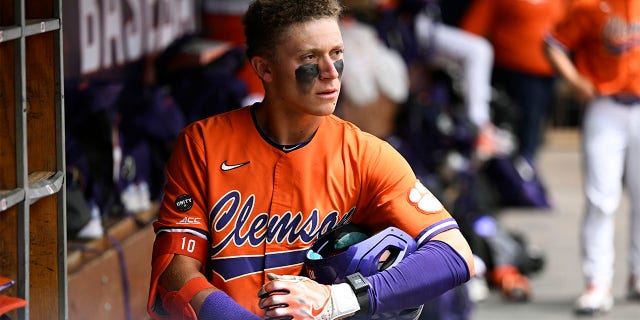 Cam Cannarella stands in the dugout