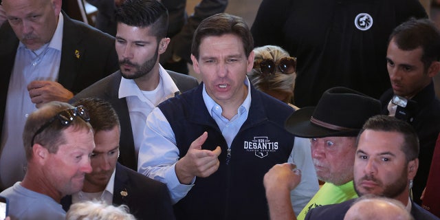 Florida Gov. Ron DeSantis greets voters in Iowa