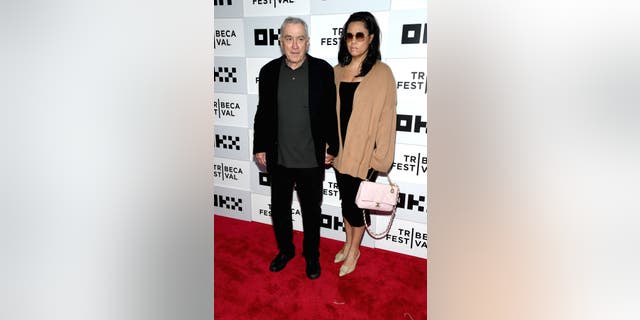 robert de niro with girlfriend tiffany chen at tribeca