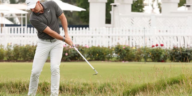 Rory McIlroy whiffs a shot at the US Open