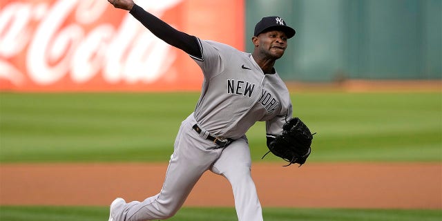 Domingo German pitches against the Oakland A's
