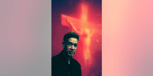 Andres Serrano with "Piss Christ"