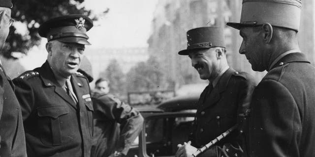 Eisenhower talking to a general in France